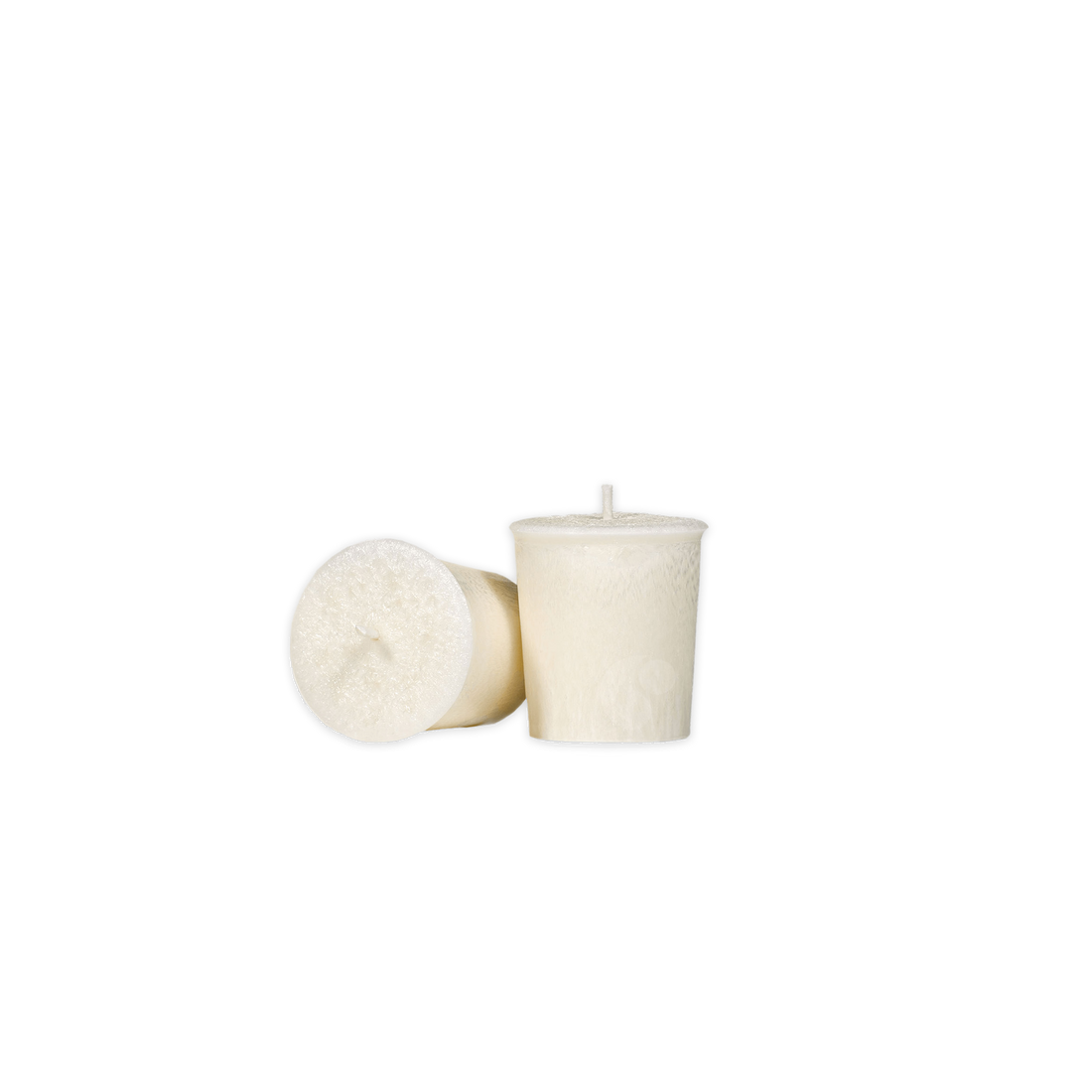 Two white candles on a white background