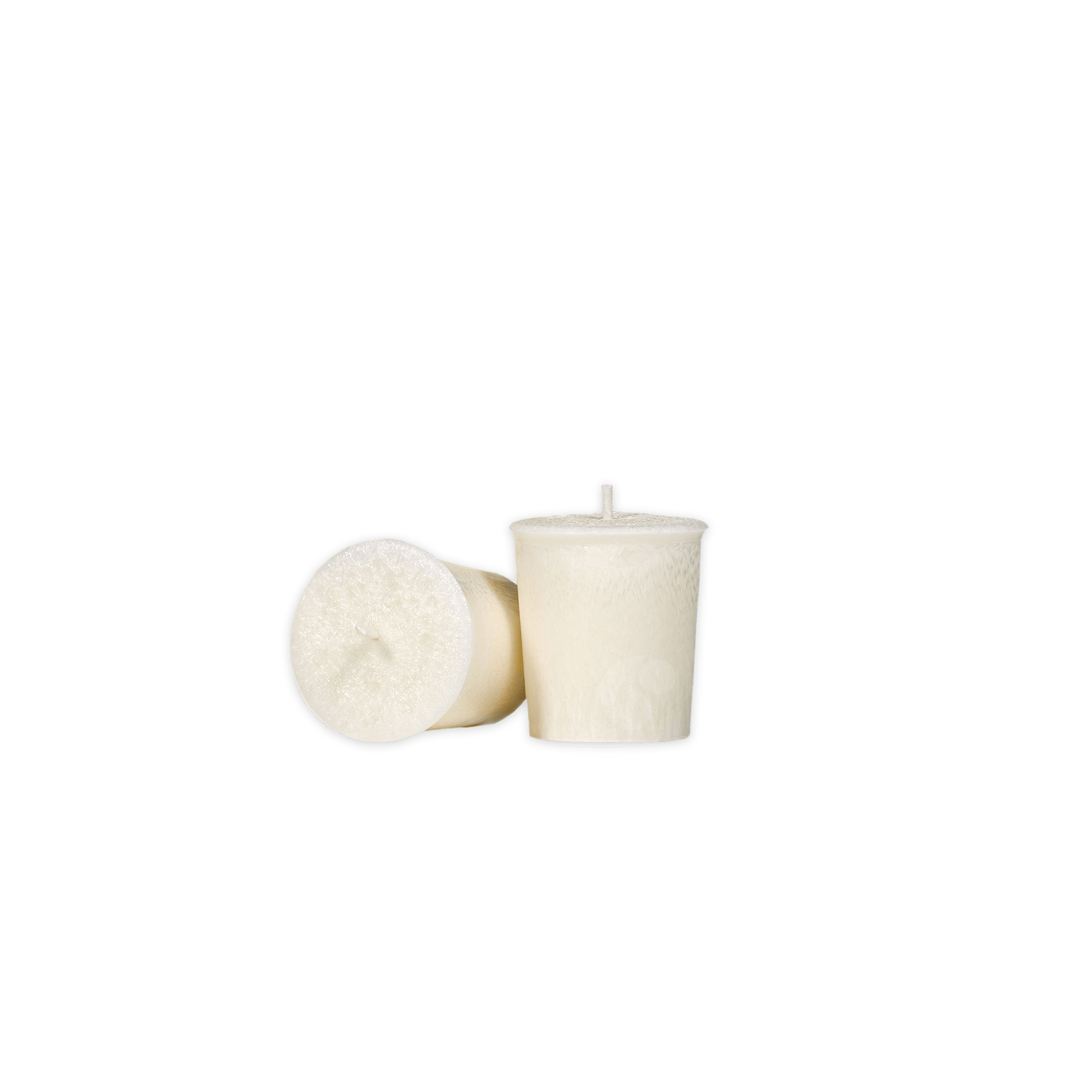 Two white candles on a white background