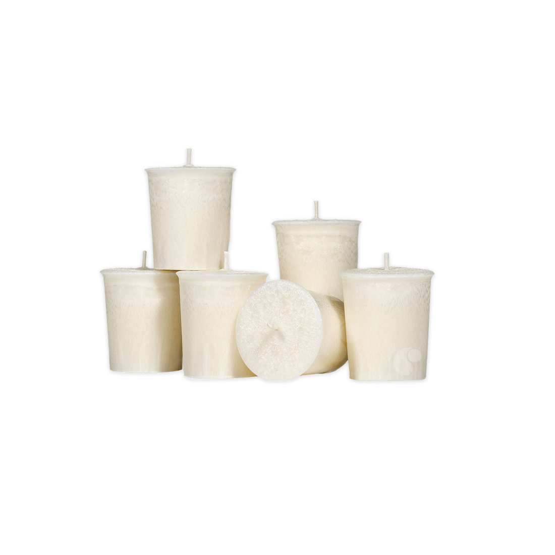 Set of white candles on a white background